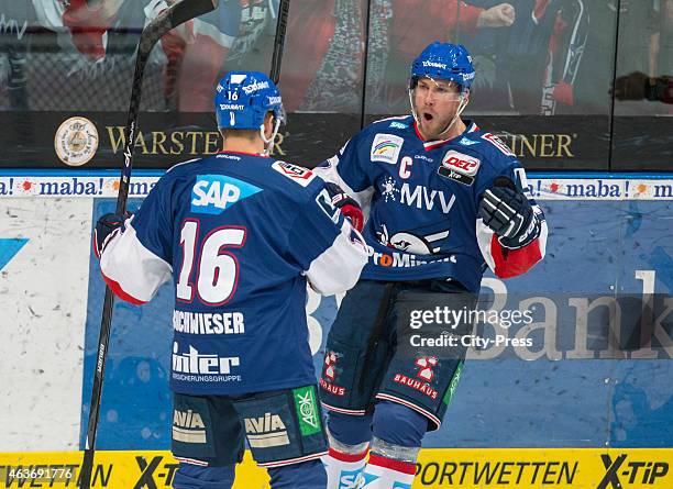 Martin Buchwieser and Marcus Kink of the Adler Mannheim celebrate after scoring the 1:0 during the game between Adler Mannheim and Eisbaeren Berlin...