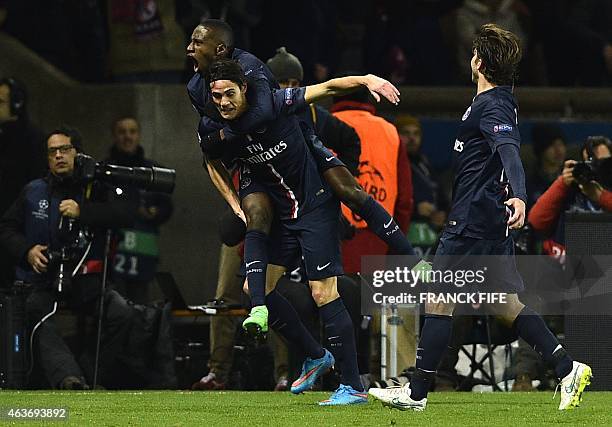 Paris Saint-Germain's Uruguayan forward Edinson Cavani celebrates with Paris Saint-Germain's midfielder Blaise Matuidi and Paris Saint-Germain's...