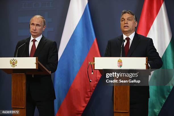 Russian President Vladimir Putin and Hungarian Prime Minister Viktor Orban speak to the media following a signing ceremony of several agreements...