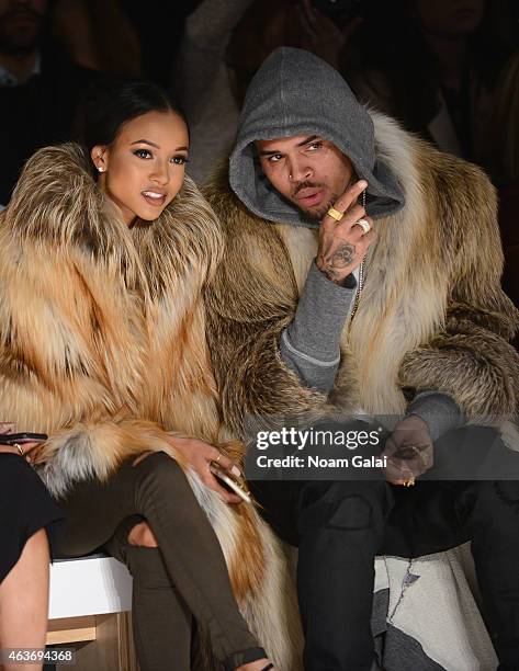 Karrueche Tran and Chris Brown attends the Michael Costello fashion show during Mercedes-Benz Fashion Week Fall 2015 at The Salon at Lincoln Center...