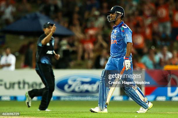 Dhoni of India leaves the field after being dismissed during the first One Day International match between New Zealand and India at McLean Park on...