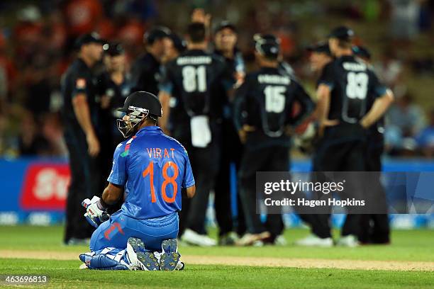 Virat Kohli of India looks on after the dismissal MS Dhoni during the first One Day International match between New Zealand and India at McLean Park...