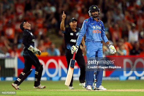 Ravindra Jadeja of India reacts after being dismissed during the first One Day International match between New Zealand and India at McLean Park on...