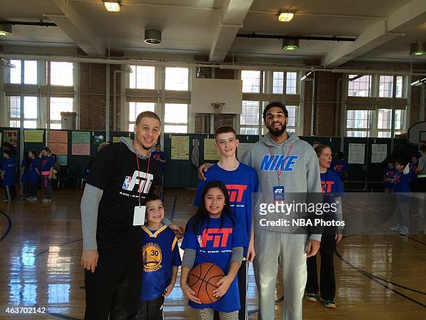 Seth Curry of the Erie BayHawks and D.J. Seeley 18# of the Delaware 87ers participate in NBA Cares/FIT Day of Service at P.S. 030 Westerleigh during...