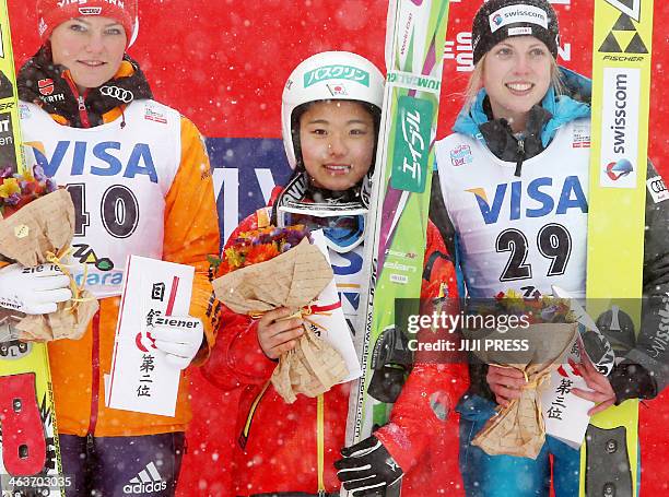 Winners of the women's World Cup ski jumping competition, first place Japan's Sara Takanashi , second place Germany's Carina Vogt , and third place...