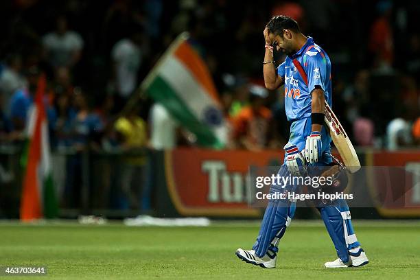 Virat Kohli of India shows his disappointment after being dismissed during the first One Day International match between New Zealand and India at...