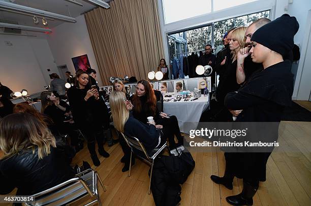 Model prepares backstage at the Rachel Zoe presentation during Mercedes-Benz Fashion Week Fall 2015 at Affirmation Arts on February 17, 2015 in New...