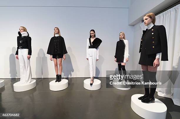 Models pose at the Rachel Zoe presentation during Mercedes-Benz Fashion Week Fall 2015 at Affirmation Arts on February 17, 2015 in New York City.