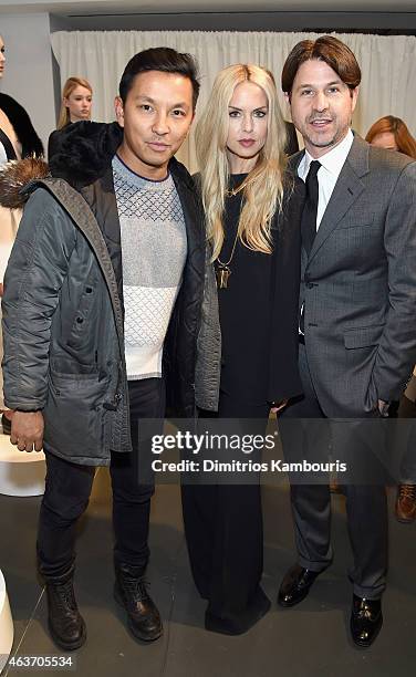 Prabal Gurung, Rachel Zoe and Rodger Berman pose at the Rachel Zoe presentation during Mercedes-Benz Fashion Week Fall 2015 at Affirmation Arts on...