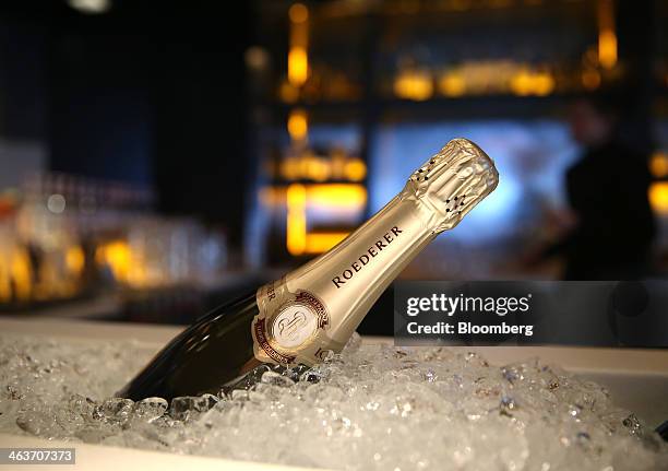 Bottle of Louis Roederer champagne sits on ice in the 'Studio Grigio' bar at the InterContinental hotel Davos, operated by InterContinental Hotels...