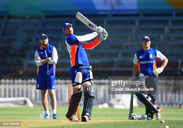 Alex Hales of England plays a shot as Gary Ballance looks on during an England nets session at Basin Reserve on February 18, 2015 in Wellington, New...