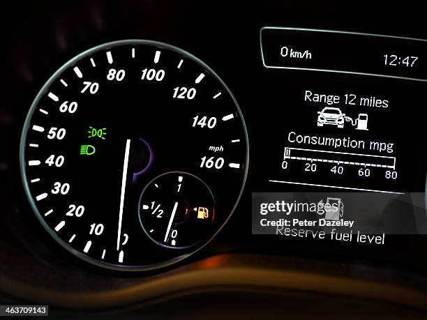 low fuel gauge - mileometer stock pictures, royalty-free photos & images