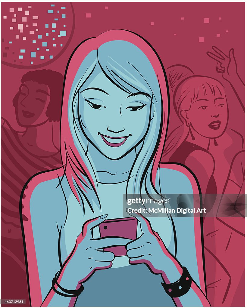 Woman using cell phone in night club