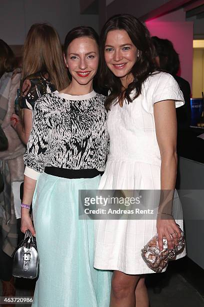Katharina Schuettler and Hannah Herzsprung attend the 'Traumfrauen' after premiere party on February 17, 2015 in Berlin, Germany.
