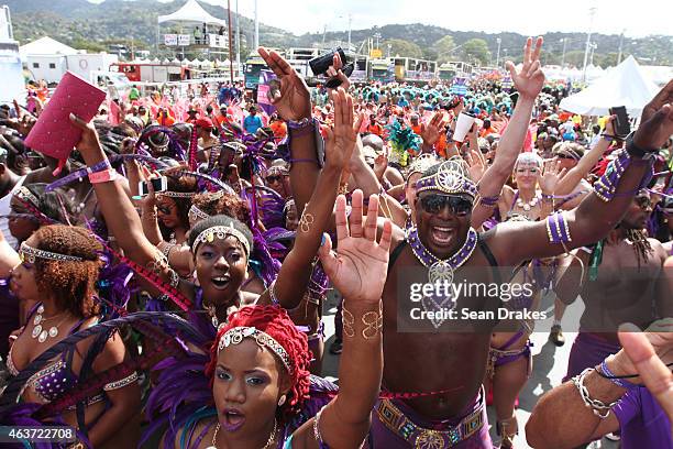 Masqueraders from the band Fantasy Carnival perform in the Queen's Park Savannah during the Parade of Bands as part of Trinidad and Tobago Carnival...