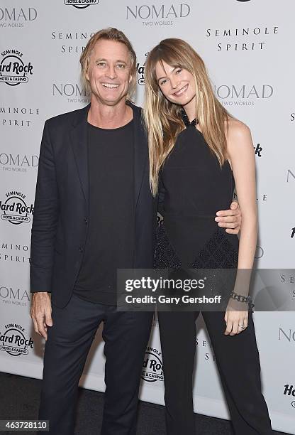 Photographer Russell James and model Behati Prinsloo attend the "Seminole Spirit" Art Collection Unveiling at Stephen Weiss Studio on February 17,...