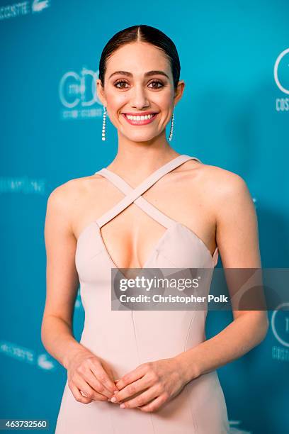 Host Emmy Rossum attends the 17th Costume Designers Guild Awards with presenting sponsor Lacoste at The Beverly Hilton Hotel on February 17, 2015 in...