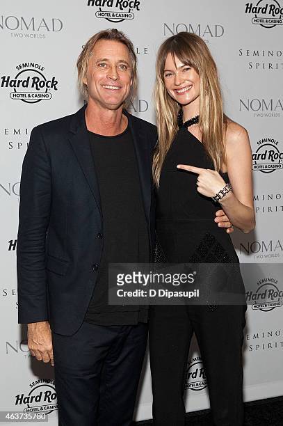 Russell James and Behati Prinsloo attend the"Seminole Spirit" Art Exhibition Party at Stephen Weiss Studio on February 17, 2015 in New York City.
