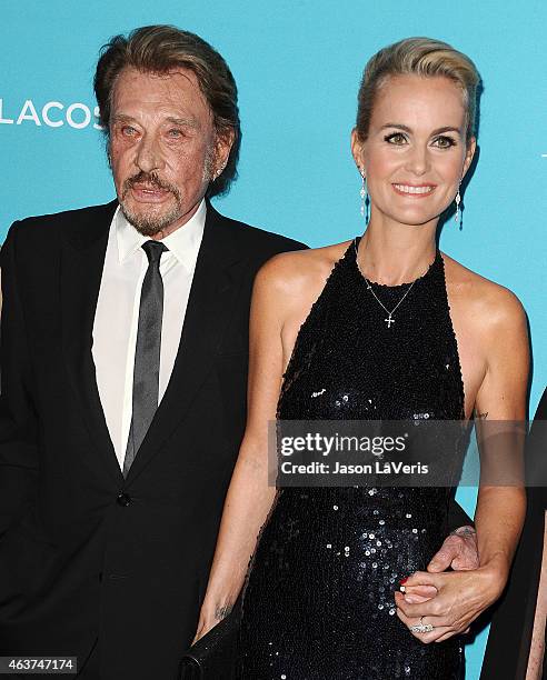 Singer Johnny Hallyday and actress Laeticia Hallyday attend the 17th Costume Designers Guild Awards at The Beverly Hilton Hotel on February 17, 2015...