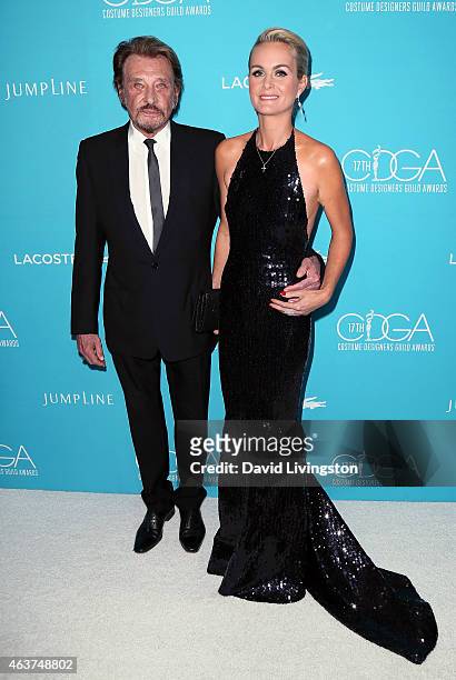 Singer Johnny Hallyday and wife Laeticia Hallyday attend the 17th Costume Designers Guild Awards with presenting sponsor Lacoste at The Beverly...