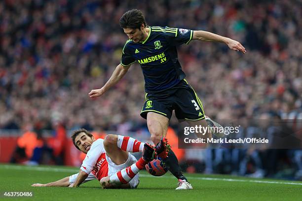 George Friend of Middlesbrough in action with Mathieu Flamini of Arsenal during the FA Cup Fifth Round match between Arsenal and Middlesbrough at...