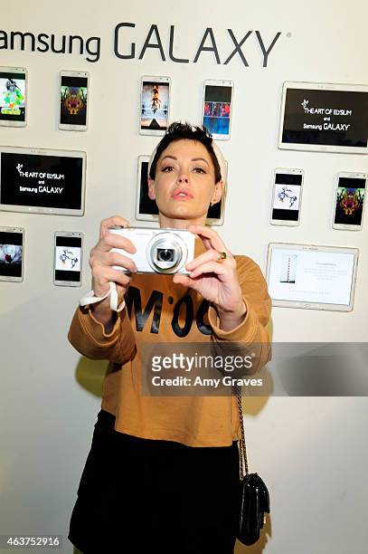 Rose McGowan attends the 8th Annual Pieces of Heaven Art Auction Presented by Samsung Galaxy at MAMA Gallery on February 17, 2015 in Los Angeles,...