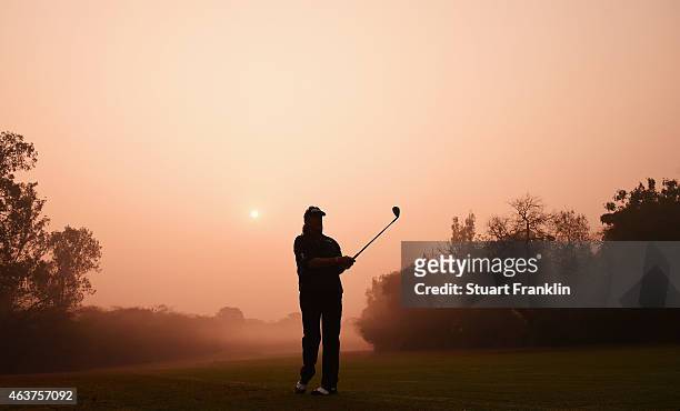 Miguel Angel Jimenez of Spain plays a shot during the pro - am prior to the start of the Hero India Open Golf at Delhi Golf Club on February 18, 2015...