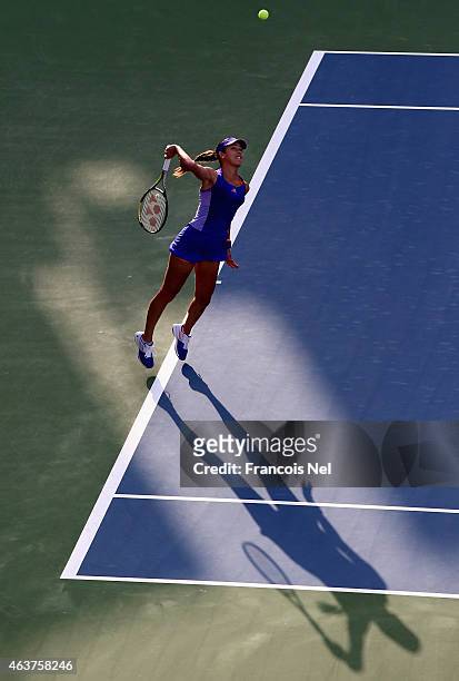 Ana Ivanovic of Serbia serves against Karolina Pliskova of the Czech Republic during day four of the WTA Dubai Duty Free Tennis Championship at the...