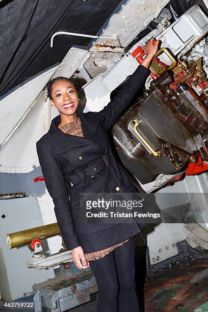 London's Official Guest of Honour, Adaeze Uyanwah fires the guns at HMS Belfast on February 18, 2015 in London, England.