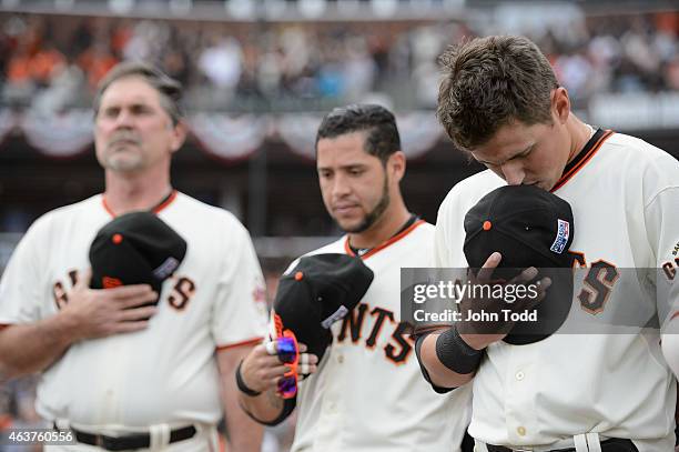 Joe Panik of the San Francisco Giants is seen concentrating during the National Anthem before Game 3 of the NLCS against the St. Louis Cardinals at...