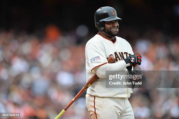 Pablo Sandoval of the San Francisco Giants looks on during Game 3 of the NLCS against the St. Louis Cardinals at AT&T Park on Tuesday, October 14,...