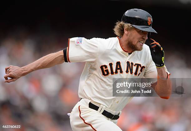 Hunter Pence of the San Francisco Giants runs to first base during Game 3 of the NLCS against the St. Louis Cardinals at AT&T Park on Tuesday,...