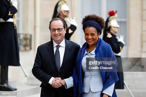 French President Francois Hollande welcomes Francophonie General-Secretary Michaelle Jean prior a meeting at the Elysee Palace on February 18, 2015...