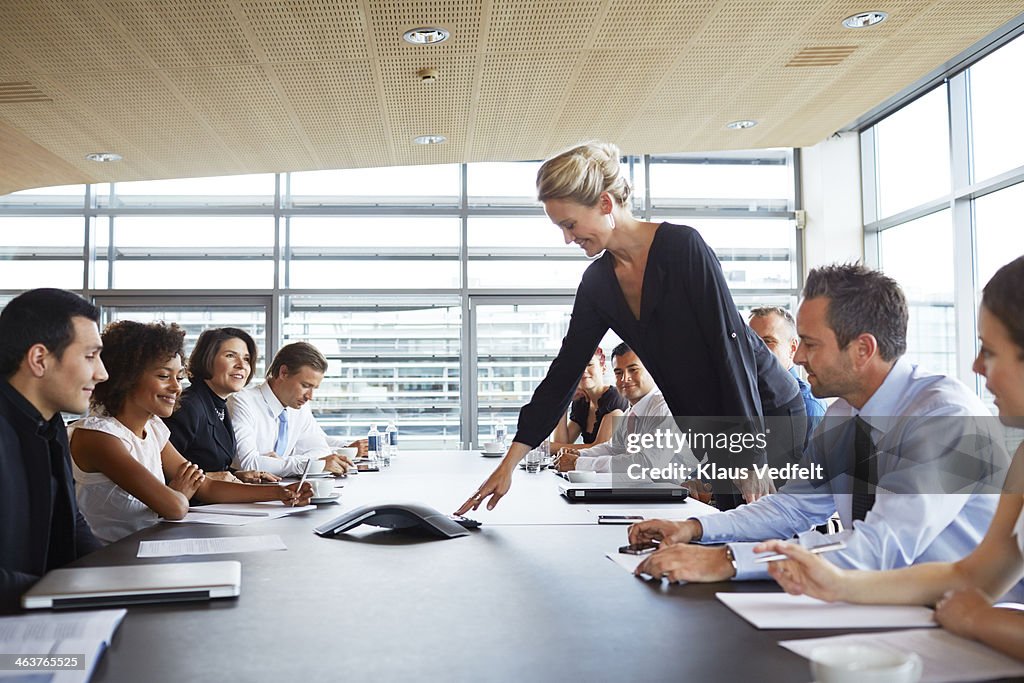 Big group of businesspeople making conference call