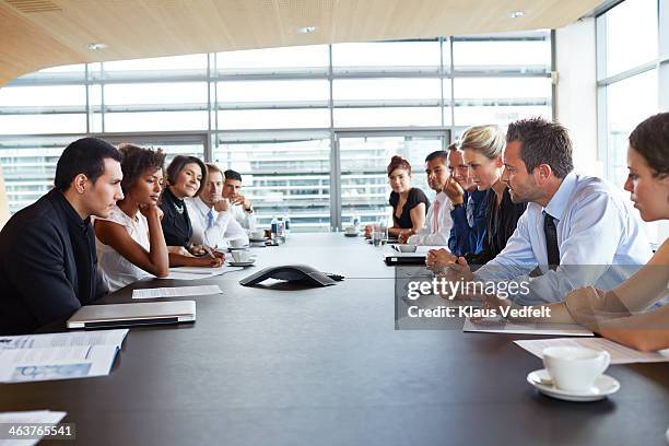 11 business people having a conference call - board room table stock pictures, royalty-free photos & images