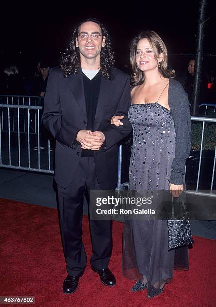 Director Tom Shadyac and date attend the "Patch Adams" New York City Premiere on December 13, 1998 at the Ziegfeld Theatre in New York City.