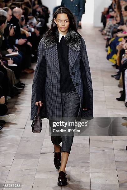 Binx Walton walks the runway at the Michael Kors fashion show during Mercedes-Benz Fashion Week Fall at Spring Studios on February 18, 2015 in New...