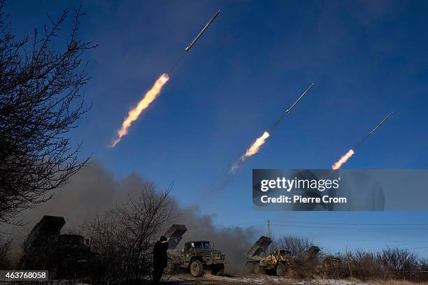 Pro-Russian rebels fire artillery grad rockets towards Debaltseve on February 18 near Vuglegirsk, Ukraine. Ukrainian troops have been forced to...