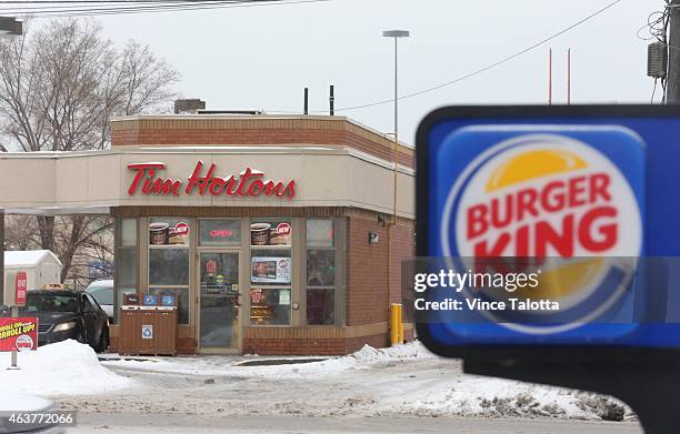 Exterior pictures of both Tim Hortons and Burger King located across the street from one another on the Queensway in Etobicoke.