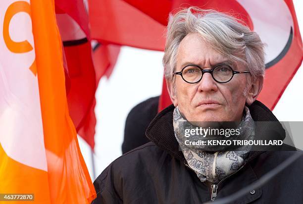 Secretary General of French Force Ouvriere labour union Jean-Claude Mailly, takes part in a demonstration during a global day of action to defend the...
