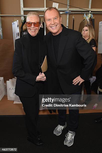 Joan Kors and designer Michael Kors pose backstage at the Michael Kors fashion show during Mercedes-Benz Fashion Week Fall 2015 at Spring Studios on...