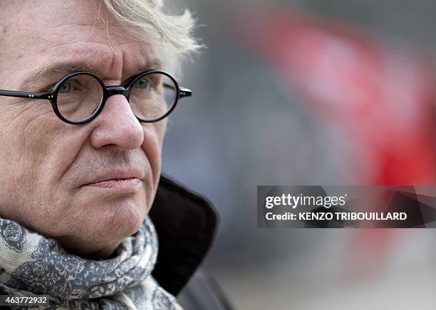 Secretary General of French Force Ouvriere labour union Jean-Claude Mailly, takes part in a demonstration during a global day of action to defend the...