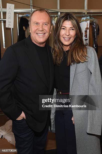 Designer Michael Kors and Nina Garcia pose backstage at the Michael Kors fashion show during Mercedes-Benz Fashion Week Fall 2015 at Spring Studios...