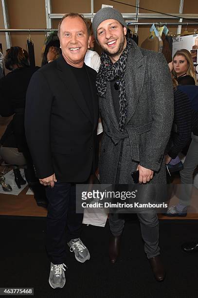 Designer Michael Kors and Lance LePere pose backstage at the Michael Kors fashion show during Mercedes-Benz Fashion Week Fall 2015 at Spring Studios...
