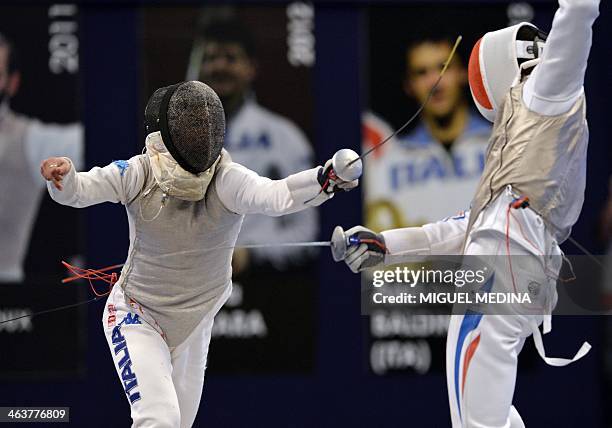 France's Enzo Lefort competes against Italia's Andrea Baldini during their 2014 Paris International Challenge foil men's team final fight in Paris,...