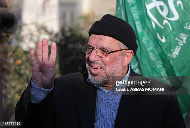 Sheikh Hassan Yousef , a prominent leader of the Hamas Islamic movement, flashes the four finger "Rabaa" sign, remembering those killed in the...