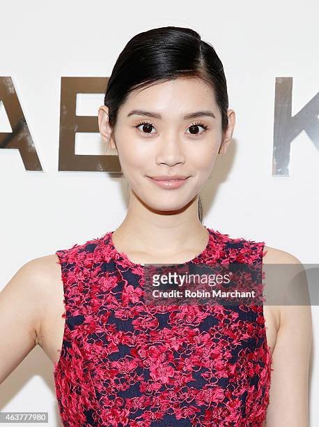 Ming Xi attends Michael Kors at Spring Studios on February 18, 2015 in New York City.