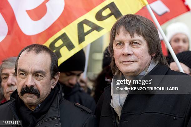 Newly elected CGT Secretary General Philippe Martinez and his predecessor Bernard Thibault stand together as they demonstrate during a global day of...