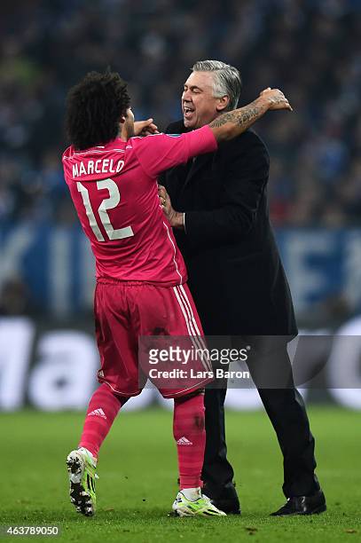 Marcelo of Real Madrid celebrates with Carlo Ancelotti the head coach of Real Madrid after scoring his team's second goal during the UEFA Champions...