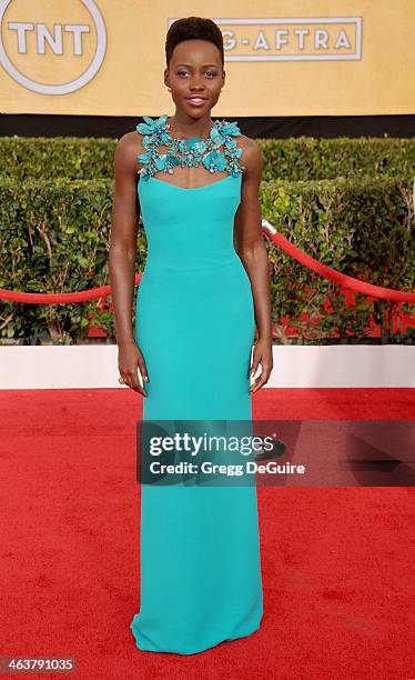 Actress Lupita Nyong'o arrives at the 20th Annual Screen Actors Guild Awards at The Shrine Auditorium on January 18, 2014 in Los Angeles, California.